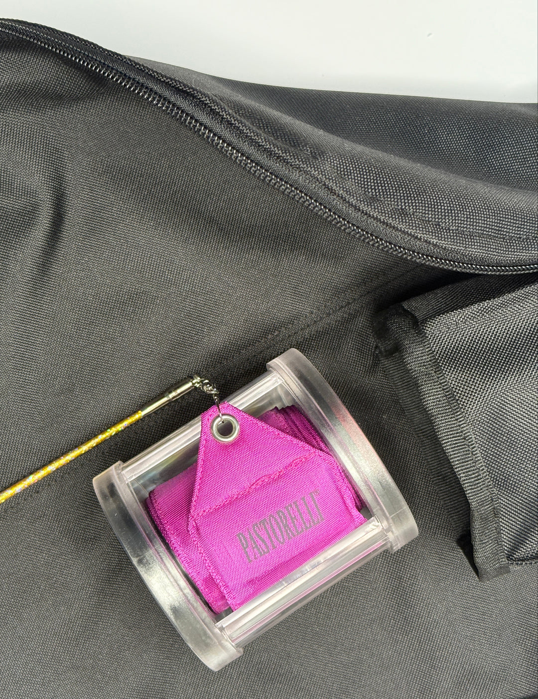 COVER FOR STICK AND RIBBON IN RIBBON ROLLER